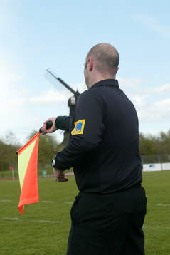 Liljeman, assisterande domare, flagga, väderkvarn