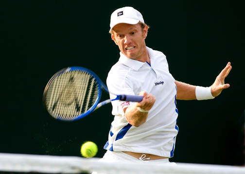 Tennis. Wimbledon. Thomas Johansson i aktion i matchen mot