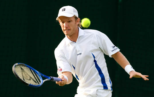 Tennis. Wimbledon. Thomas Johansson i aktion mot Bohdan