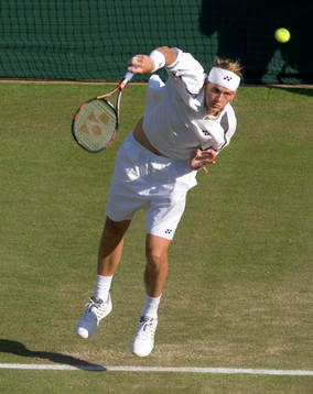 Tennis. Wimbledon. Joachim Johansson servar i matchen mot