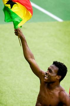  Derek Boateng, Ghana, jubel efter att de gått vidare till åttondelsfinal.
