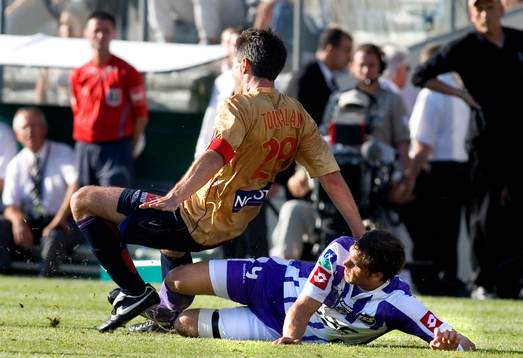 Johan Elmander, Toulouse, och Jeremy Toulalan, Lyon.