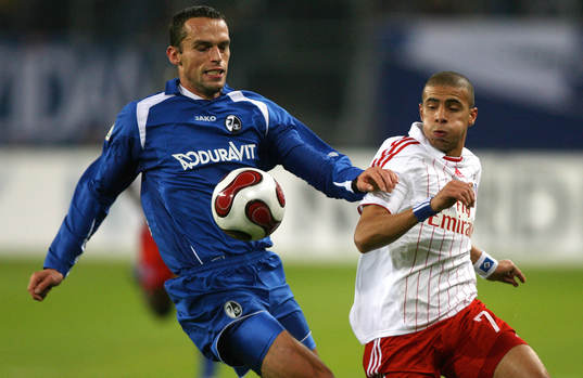    Pavel Krmas, Freiburg och Mohamed Zidan, Hamburg.