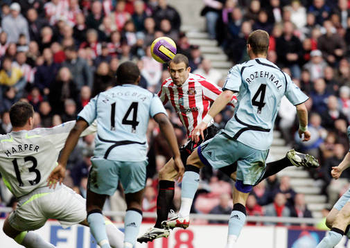  Danny Higginbotham, Sunderland gör mål. 