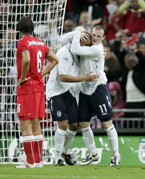  Wes Brown och Wayne Rooney, jubel.