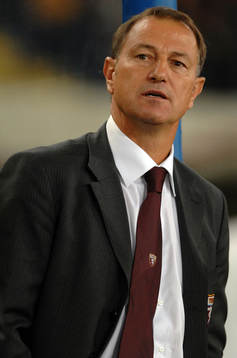 De Biasi, tränare