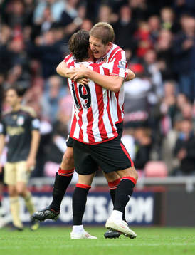  Lorik Cana och Michael Turner, Sunderland, glädje, jubel.