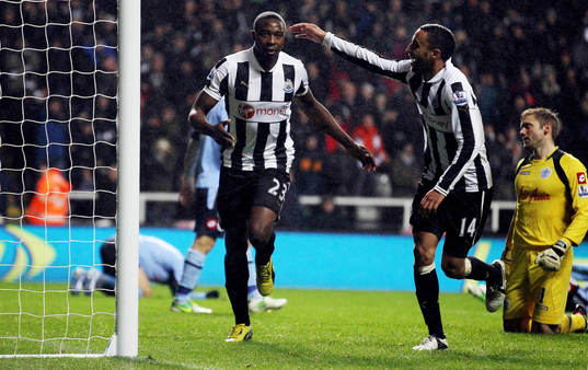 l - Newcastle United v Queens Park Rangers - Barclays Premier League - St James' Park - 22/12/12 Shola Ameobi celebrates with James Perch (2nd R)