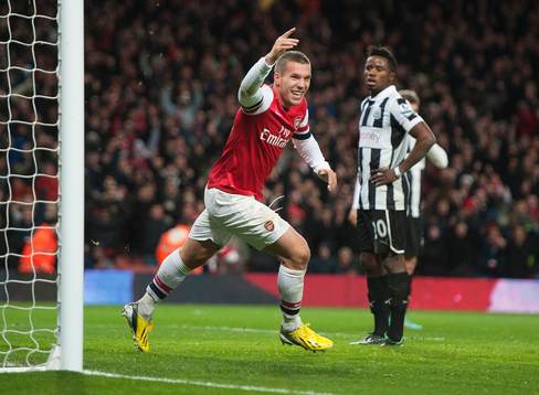  Football - Arsenal v Newcastle United - Barclays Premier League  - Emirates Stadium - 29/12/12 Lukas Podolski celebrates scoring Arsenal's third goal