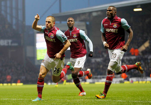 l - West Ham United v Queens Park Rangers - Barclays Premier League  - Upton Park - 19/1/13 West Ham United's Joe Cole celebrates scoring their first goal with Carlton Cole and  Guy Demel 
