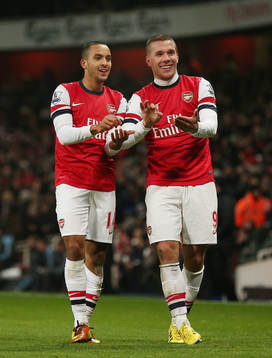 Football - Arsenal v West Ham United - Barclays Premier League  - Emirates Stadium - 23/1/13 Theo Walcott (L) celebrates with Lukas Podolski