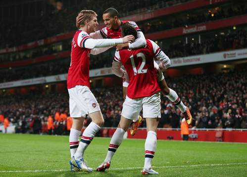 Football - Arsenal v West Ham United - Barclays Premier League  - Emirates Stadium - 23/1/13 Olivier Giroud (R) celebrates with Per Mertesacker (L) and Theo Walcott
