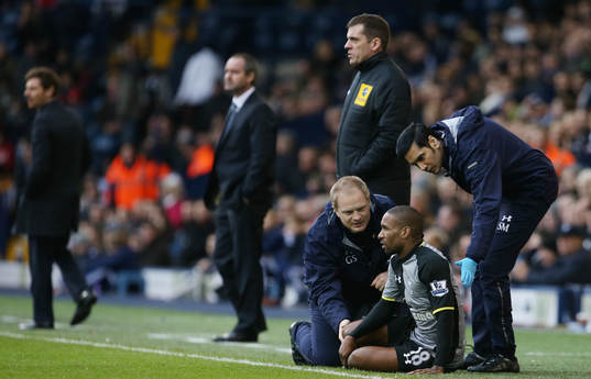 l - West Bromwich Albion v Tottenham Hotspur - Barclays Premier League  - The Hawthorns - 3/2/13 Tottenham's Jermain Defoe (2nd R) recieves treatment