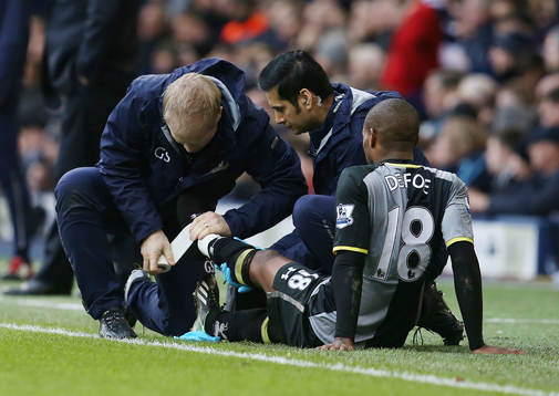 l - West Bromwich Albion v Tottenham Hotspur - Barclays Premier League  - The Hawthorns - 3/2/13 Tottenham's Jermain Defoe (R) recieves treatment