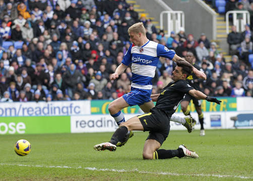 l - Reading v Wigan Athletic - Barclays Premier League  - The Madejski Stadium - 23/2/13 Reading's Pavel Pogrebnyak (L) and Wigan's Paul Scharner in action