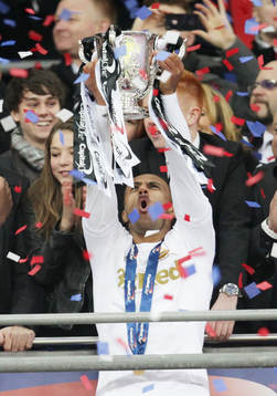 l - Bradford City v Swansea City - Capital One Cup Final - Wembley Stadium - 24/2/13 Swansea City's Wayne Routledge celebrates with the Capital One Cup 