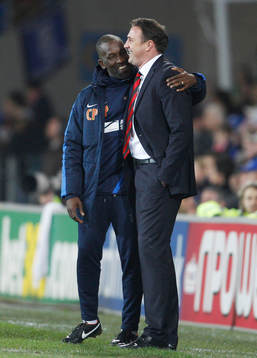 l - Cardiff City v Charlton Athletic - npower Football League Championship - Cardiff City Stadium  - 16/4/13 Charlton Athletic manager Chris Powell (L) congratulates Cardiff City manager Malky Mackay at the full time whistle