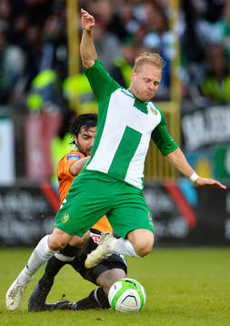Varbergs Ahmet Özdemirok fäller Erik Sundin och blir utvisad i matchen mellan Hammarby och Varberg i Superettan i fotboll 10 juni 2013 i Stockholm.