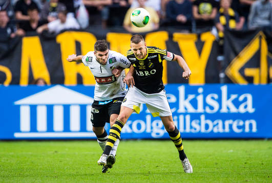 s Alexander Milosevic  i den allsvenska matchen mellan AIK och Häcken den 7 juli 2013 i Stockholm.