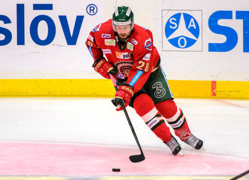 Frölundas Dick Axelsson med pucken