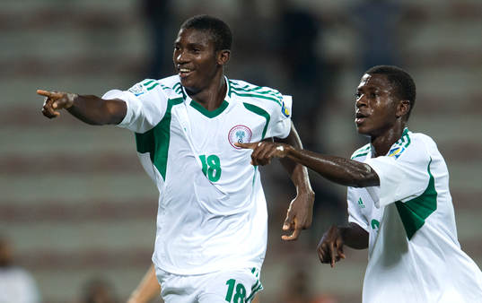 Nigerias Taiwo AWONIYI jublar efter att ha gjort 1-0
