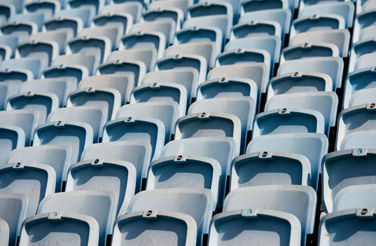 Tomma stolar på läktaren på Swedbank Stadion innan den allsvenska fotbollsmatchen mellan Malmö FF och Falkenberg den 30 mars 2014 i Malmö.