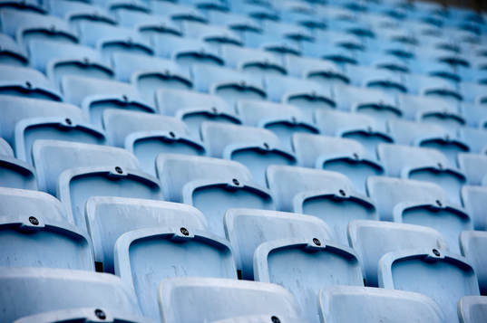 Tomma stolar på läktaren på Swedbank Stadion innan den allsvenska fotbollsmatchen mellan Malmö FF och Falkenberg den 30 mars 2014 i Malmö.