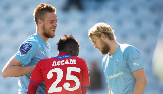 Helsingborgs David Accam och Malmös mittbackar Pontus Jansson och Filip Helander i semifinalen i Svenska Cupen mellan   Malmö FF och Helsingborg i Malmö 1 maj  2014.