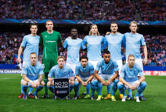 s startelva under fotbollsmatchen i Champions League mellan Atletico Madrid och Malmö FF den 22 oktober 2014 i Madrid. Övre raden från vänster: Markus Rosenberg, målvakt Robin Olsen, Enock Kofi Adu, Markus Halsti, Erik Johansson och Filip Helander. Nedre raden från vänster: Magnus Eriksson, Emil Forsberg, Ricardo Ferreira Da Silva, Isaac Kiese Thelin och Anton Tinnerholm.