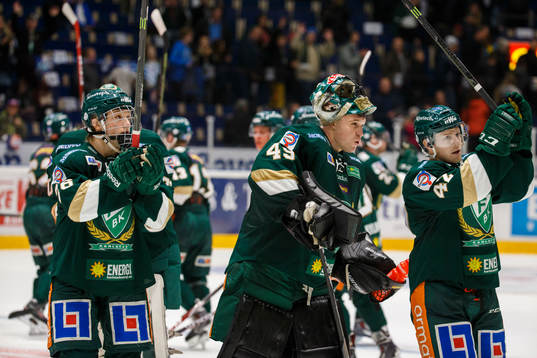 Färjestads Rasmus Asplund, målvakt Justin Pogge och