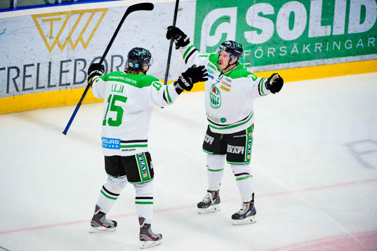 Rögles Jakob Lilja jublar med Peter LeBlanc som gjort 2-0