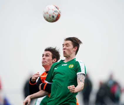 Hammarbys Birkir Mar Saevarsson vinner nickduell i matchen i Svenska Cupen mellan Kristianstad och Hammarby i Kristianstad 21 februari 2015.