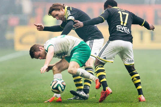s Nils-Eric Johansson och Ebenezer Ofori under fotbollsmatchen i Svenska cupen mellan AIK och Hammarby den 7 mars 2015 i Stockholm.