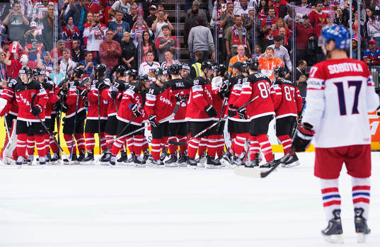 Kanadas spelare jublar