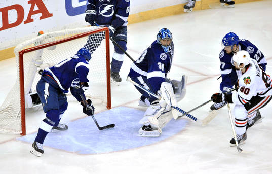 Chicago's Antoine Vermette (80) scores the game-winning