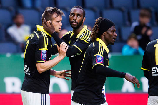 s Henok Goitom (th) kramar om Fredrik Brustad efter att han har gjort 4-1 under fotbollsmatchen i Allsvenskan mellan AIK och Sundsvall den 12 juli 2015 i Stockholm. 