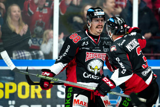 Malmö Redhawks Peter Mueller och Kent McDonell jublar