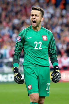 Polens målvakt Lukasz Fabianski jublar efter fotbollsmatchen mellan Tyskland och Polen