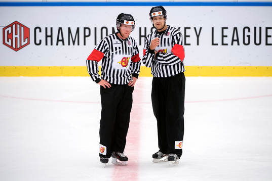 Domare Mikael Holm och Lassi Heikkinen
