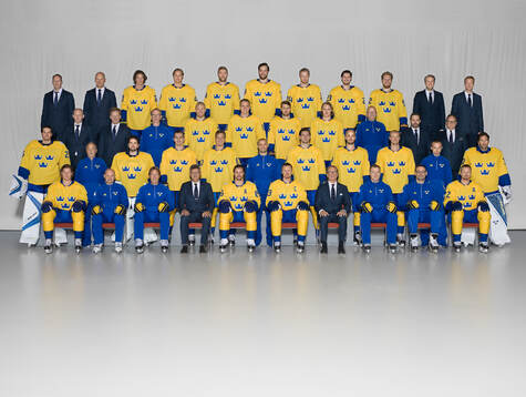 Players and team staff of Sweden pose for a team photo