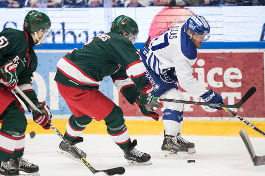 Leksands Jesper Ollas och Frölundas Henrik Tömmernes i