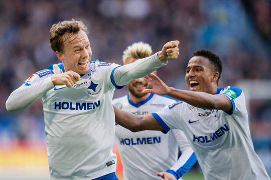 Norrköpings Gudmundur Thorarinsson gör 2-3 och jublar med Nicklas Bärkroth och Niclas Eliasson