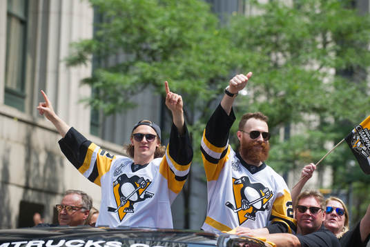 Pittsburgh Penguins' Carl Hagelin and Ian Cloe celebrate