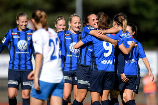 Andrea Wilmann celebrates with his teammates after scoring