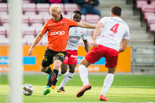 Geir André Herren of Åsane, Razak Nuhu and Mislav Leko of Fredrikstad