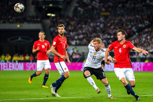 Jørgen Skjelvik and Håvard Nordtveit of Norway against Timo Werner of Germany 