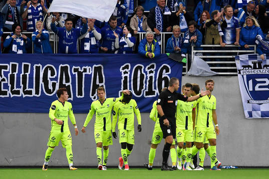Krepin Diatta, of Sarpsborg, celebrates with team mates after scoring 2-0