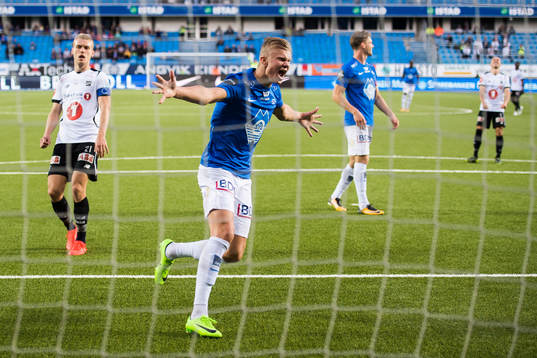 Erling Braut Haaland of Molde celebrates 1-0 during the Eliteserien match between Molde and Odd on September 11, 2017 in Molde. Steffen Hagen of Odd looks dejected to the left.

