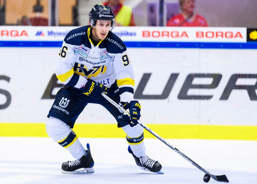 s Bill Sweatt med pucken