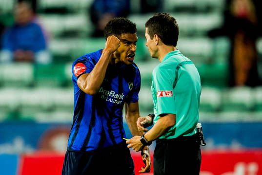 Ohikhuaeme Anthony Omoijuanfo of Stabæk reacts after receiving a yellow card by the referee Tore Hansen